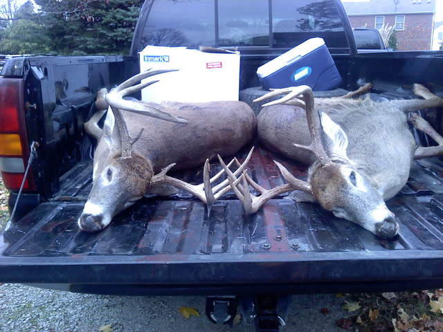 My brother and My deer from our last hunt together..TRUCK LOAD!!!